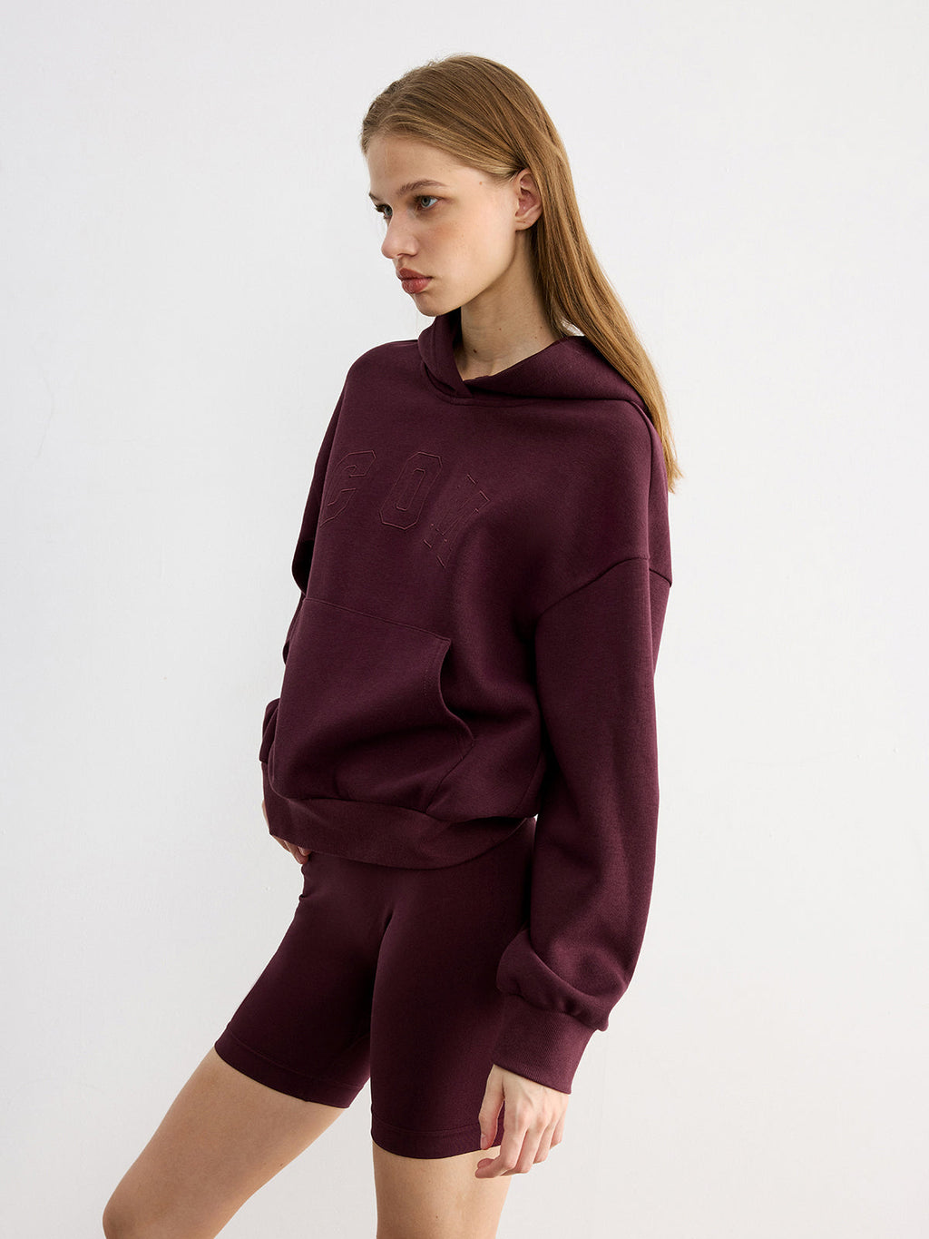 LA FINE FLEUR hoodie with embroidered letter design, featuring a casual fit and style.
