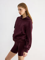 LA FINE FLEUR hoodie with embroidered letter design, featuring a casual fit and style.