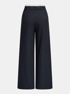 Wide leg trousers with navy pinstripes, crisp white waistband, and adjustable drawstring waist.