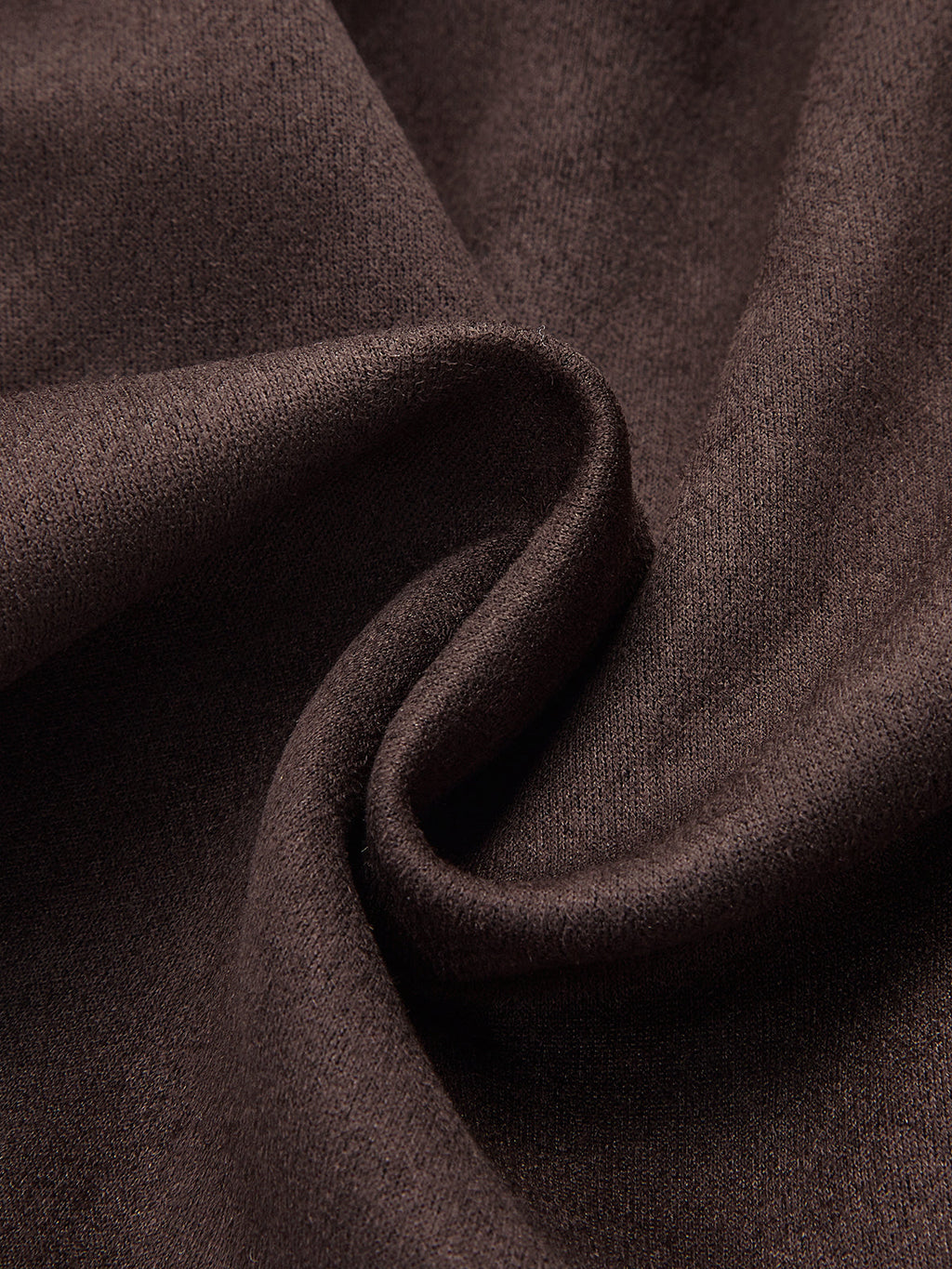 Soft, dark brown suede jacket with shawl collar and belted waist, smooth textured fabric.