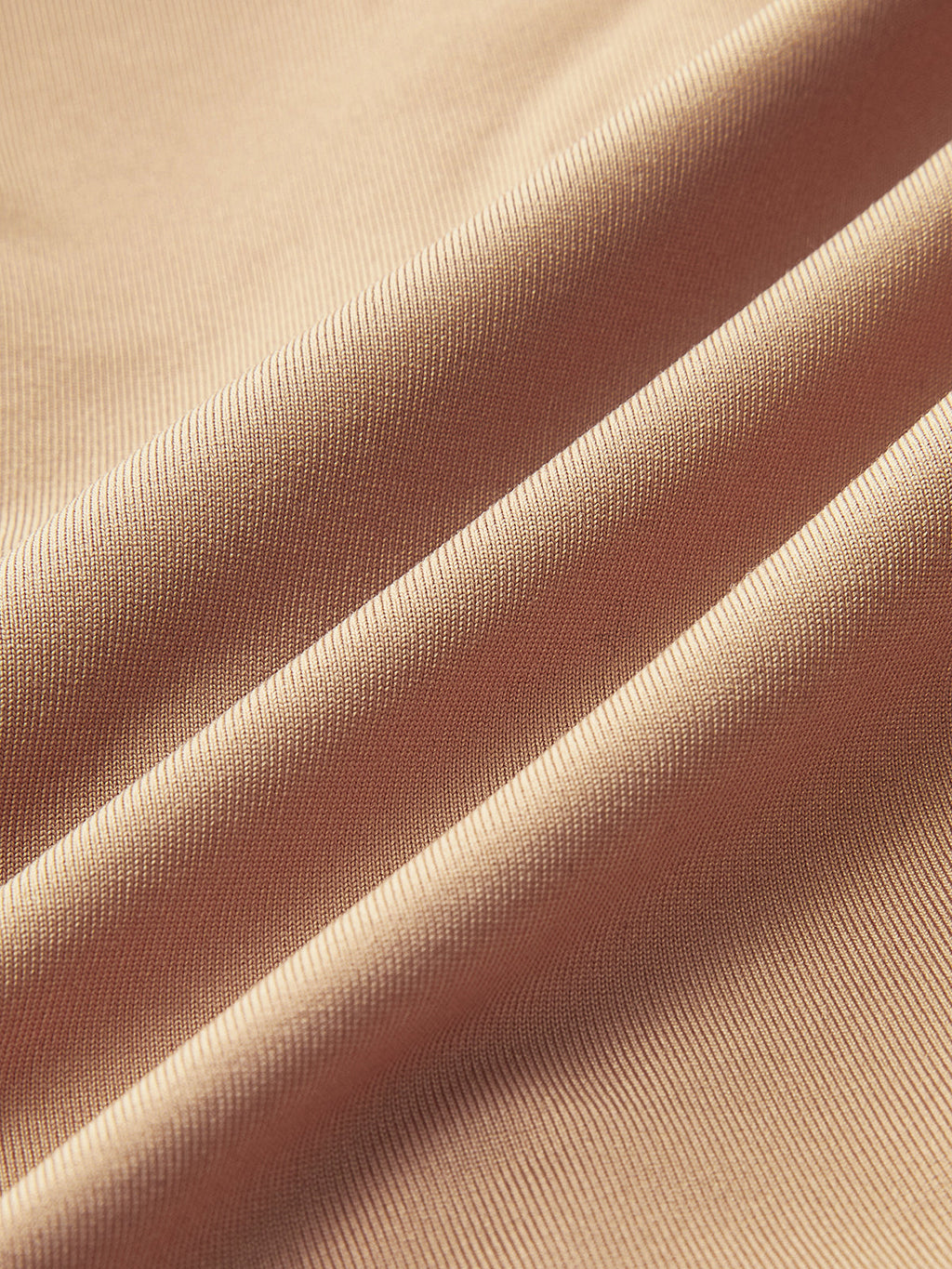 Light beige, fine ribbed Deep V-Neck Bodysuit with Buckle and long sleeves, softly folded.