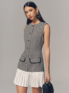 LA FINE FLEUR houndstooth sleeveless mini dress with pleated hem.
