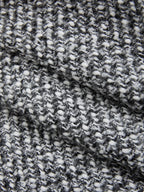 Double waistband wool blend tweed trousers with black and white textured knit, bumpy woven pattern.