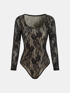 Black fitted mesh bodysuit with sheer sleeves, scoop neckline, and intricate floral lace pattern.