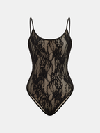 Elegant lace backless cami bodysuit with thin straps, floral detail, and nude lining.