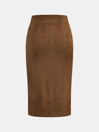 A high-waisted suede midi skirt with leather trim and waist tie, offering timeless elegance.