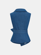 Sleeveless blue denim wrap vest with adjustable tie waist and asymmetric hem, modern design.