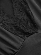 Black woven fabric bodysuit with delicate lace, floral patterns, and ruched mesh detailing.