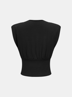 Black V-neck sleeveless double-breasted blouse with wide shoulders and a fitted waist.