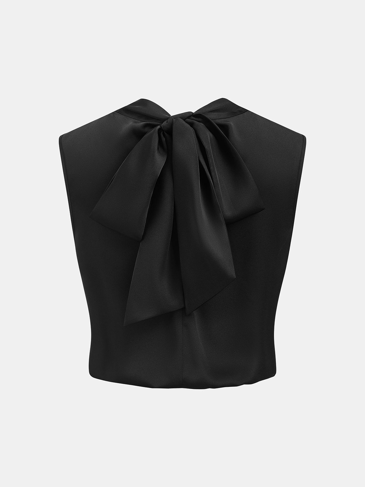 Sleeveless satin cowl-neck blouse with a large, elegant bow at the back neckline.