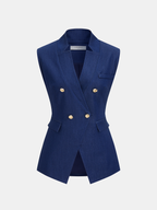 Navy blue sleeveless double-breasted blazer vest with gold buttons, notched lapel, three pockets.