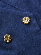 Dark blue double-breasted blazer vest with gold knot-shaped buttons for an elegant effect.