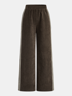 Wide-leg brown corduroy pants with white striped sides and an elastic waistband.