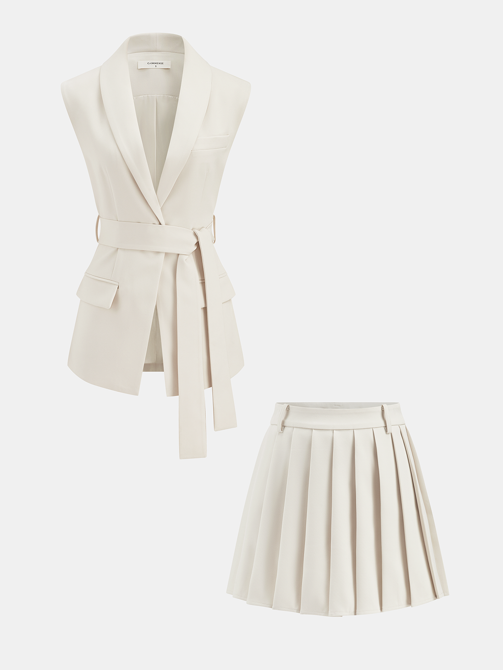 A sleeveless cream belted vest with flap pockets and a matching pleated skirt set.