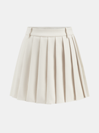 Cream high-waisted pleated mini skirt with side buttons and coordinating belted vest set.