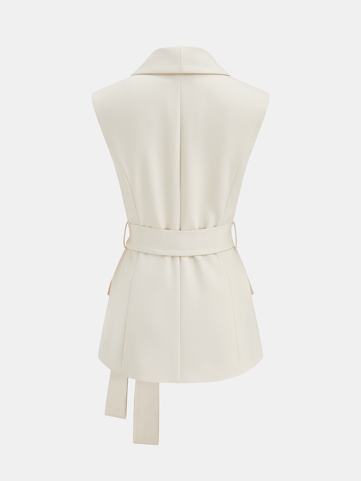 Sleeveless cream belted vest with structured collar and pleated skirt, coordinated set.