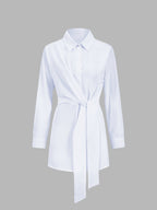 White semi-sheer long shirt with button-down front, collared neckline, and waist tie.
