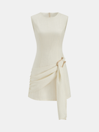 Slim-fit Tencel mini dress with sleeveless cut, round neck, gold buckle hip ruching.