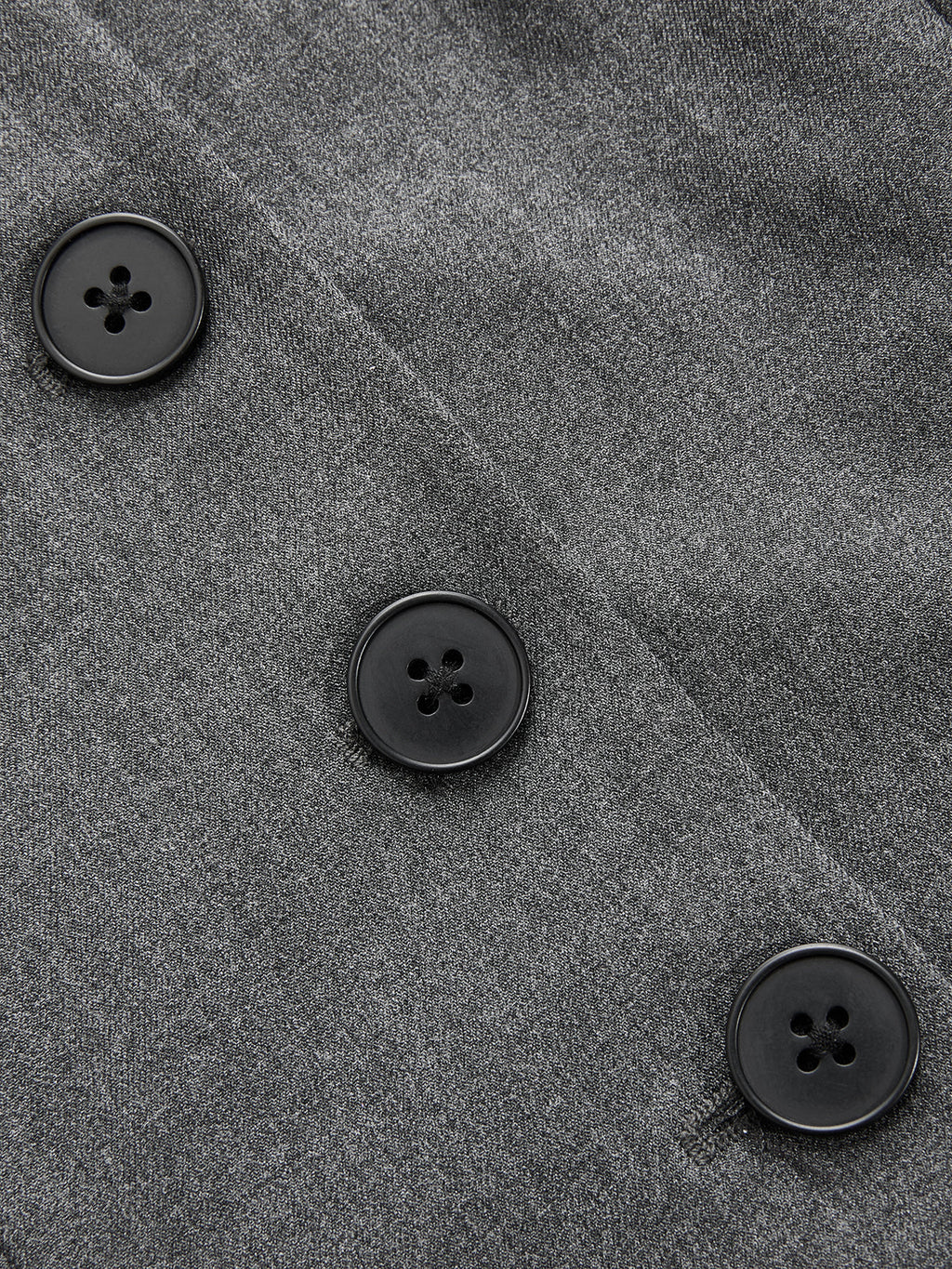 Sleeveless belted blazer dress with pleated details, gray fabric, and three black buttons.
