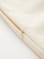 Cream LA FINE FLEUR linen-blend wrap dress with contrast trim, visible zipper, detailed stitching.