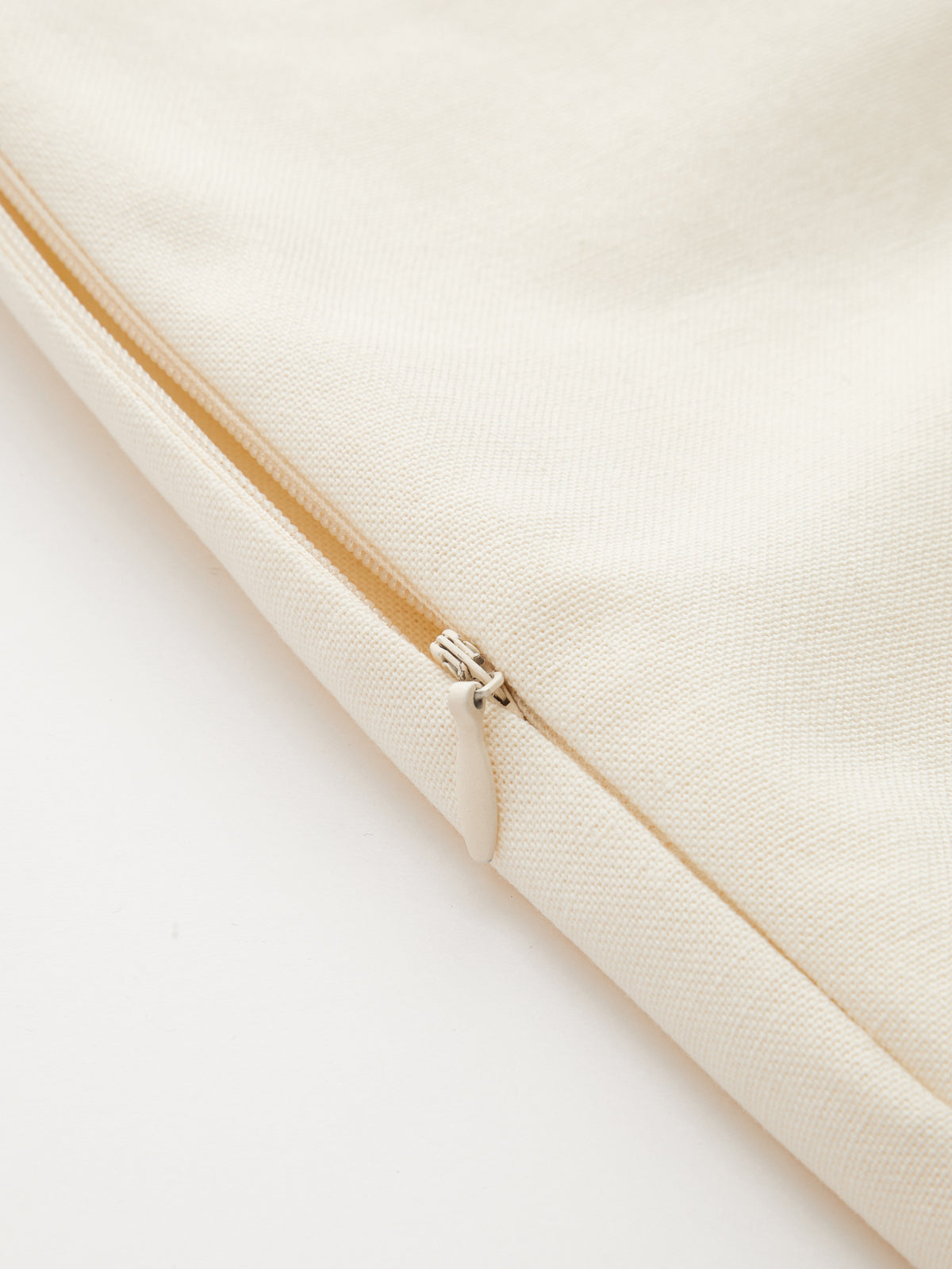 Cream LA FINE FLEUR linen-blend wrap dress with contrast trim, visible zipper, detailed stitching.