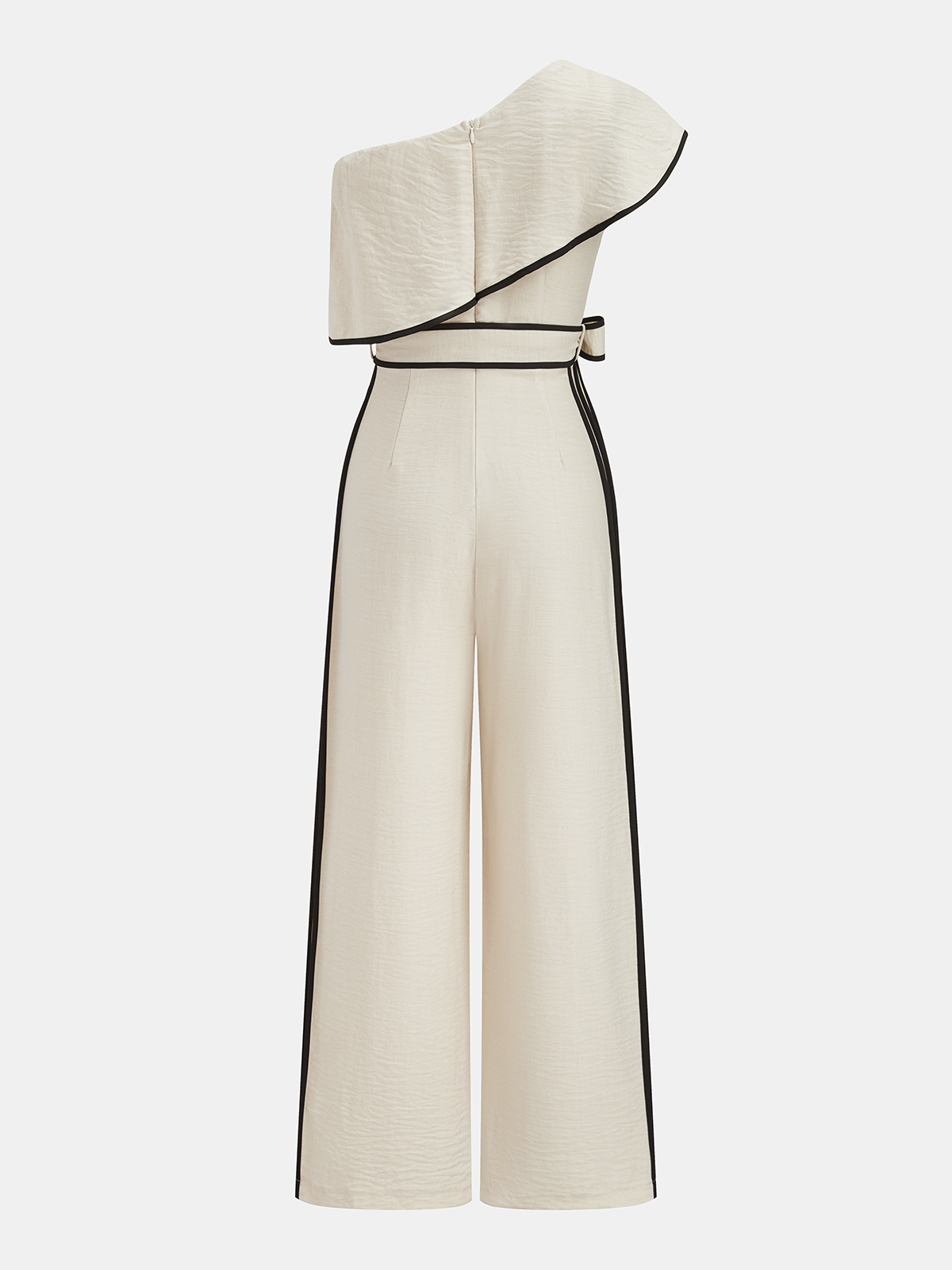 Cream one-shoulder jumpsuit with ruffle detail, black side stripes, and wide-leg silhouette.