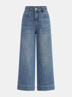 High-rise wide-leg denim jeans with visible seams, front and back pockets, button closure.