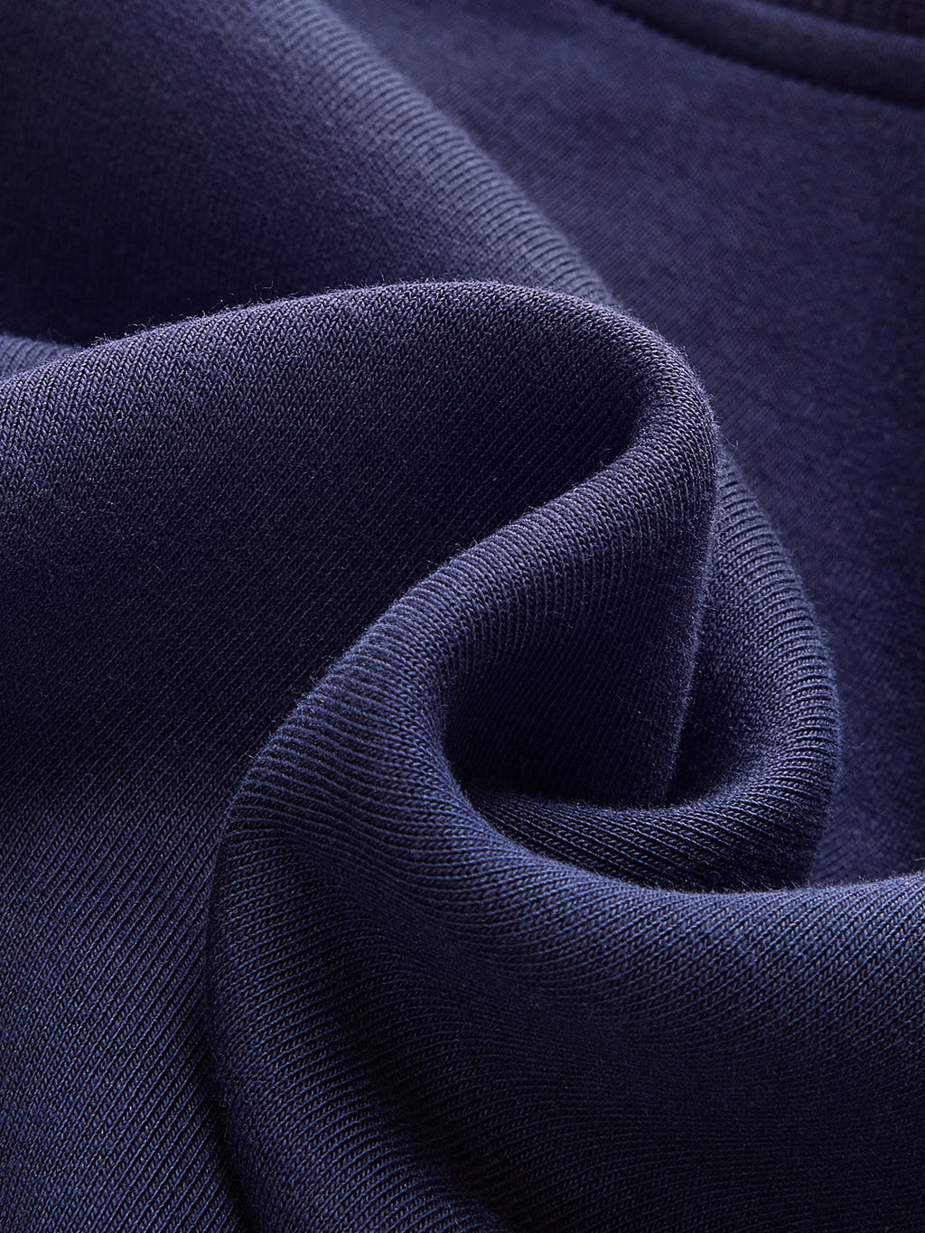 Striped off-shoulder deep blue sweatshirt with cuffs, soft cotton-rich fabric, gently folded.
