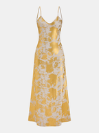Metallic V-neck slip dress with elegant straps and a backless design, effortlessly chic.