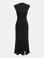 A ribbed knit maxi dress with cap sleeves, button-up side slit, and minimalist style.