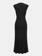 Cap sleeve ribbed knit button-up maxi dress with fitted bodice and flared skirt.