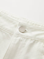 Mid-rise wide-leg jeans with soft denim, metal button, visible stitching, and Tencel cotton blend.