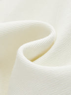 Off-white soft denim wide-leg jeans showcasing textured weave and gentle, natural fabric folds.