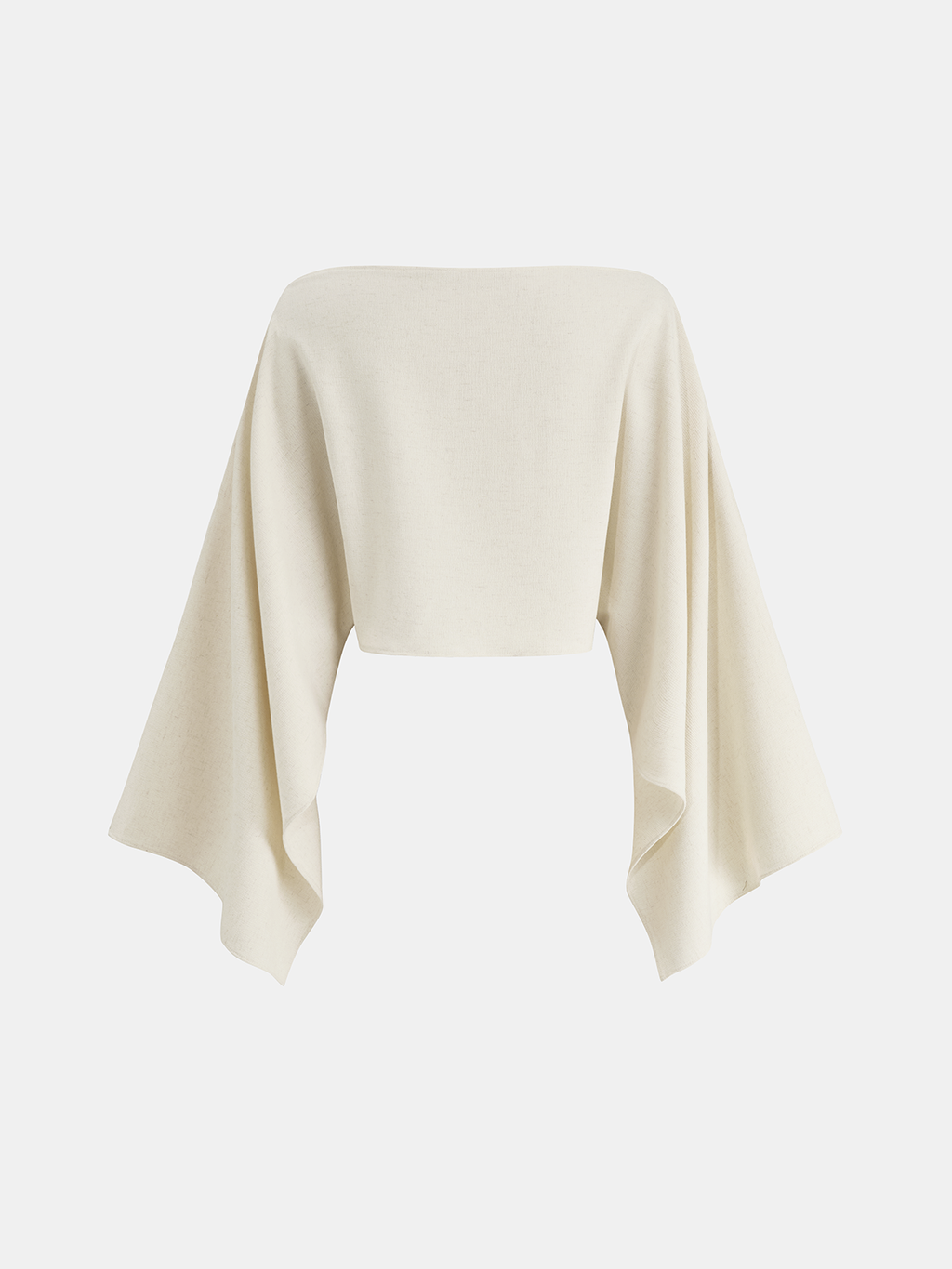 A cream linen crop top with a slim fit, off-the-shoulder cut, and bold cape sleeves.