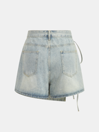Denim crossover skort with mini length, two patch pockets, yellow stitching, and side ties.