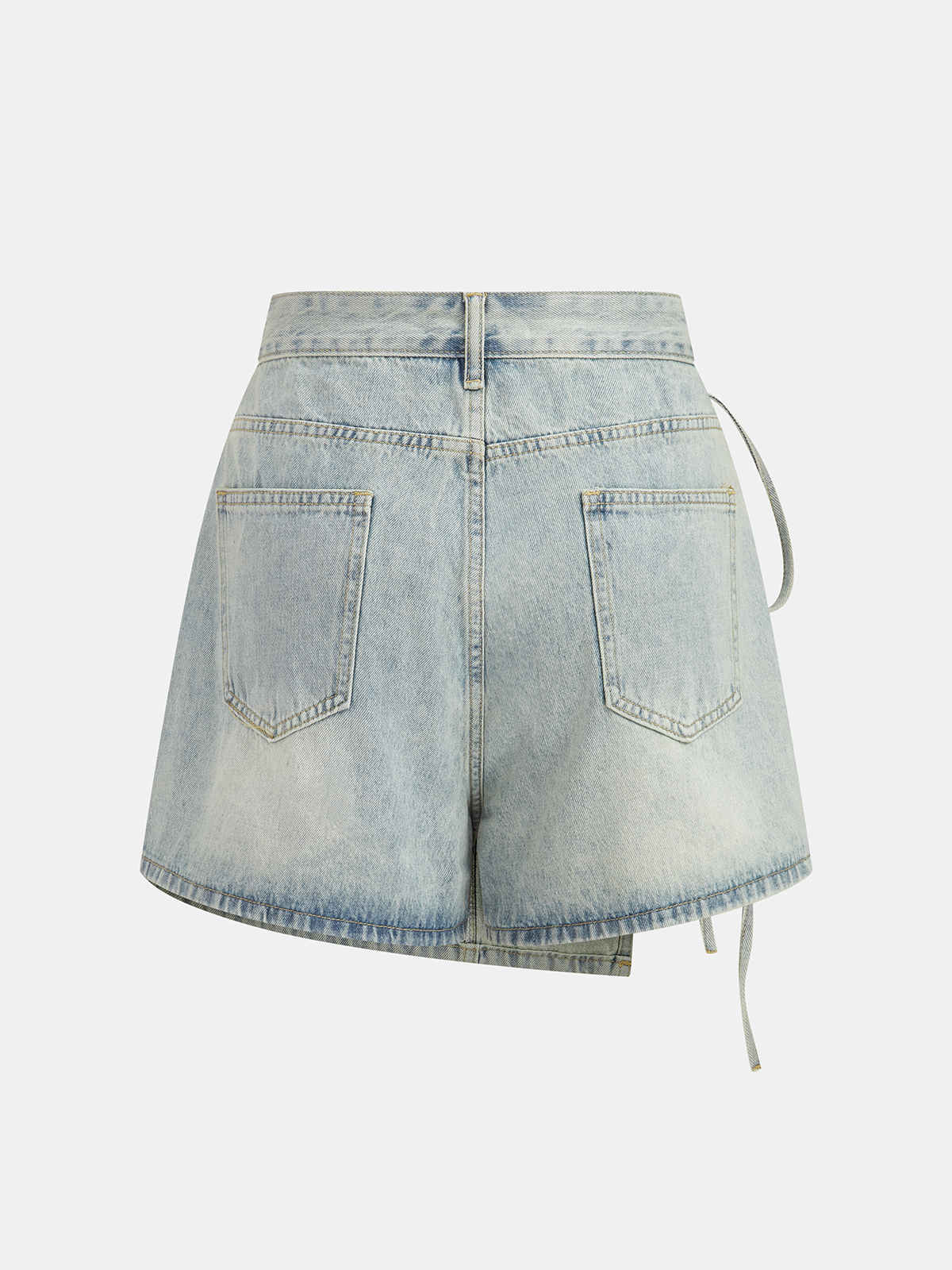 Denim crossover skort with mini length, two patch pockets, yellow stitching, and side ties.