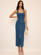 LA FINE FLEUR denim halter dress featuring a button-front maxi design.