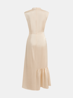 A light beige sleeveless satin midi dress with ruched split, fitted waist, side buttons, ruffled hem.
