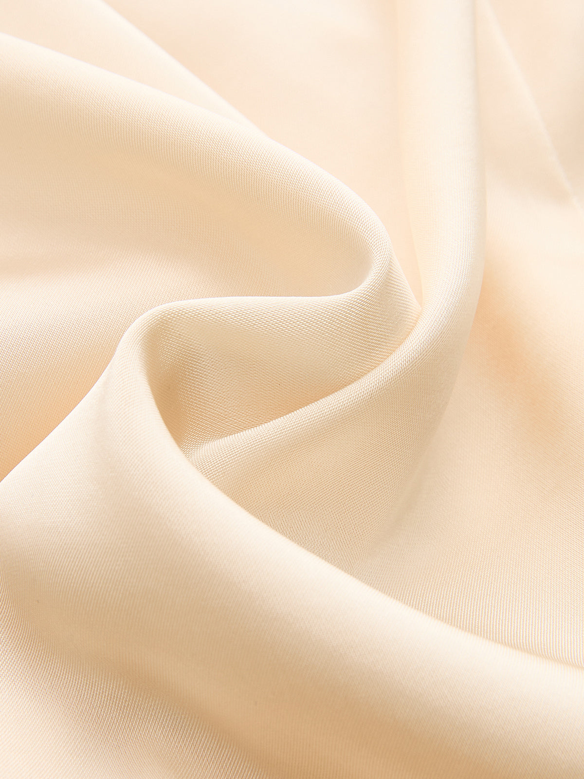 Light beige satin midi dress with ruched split detail, smooth texture and subtle sheen.