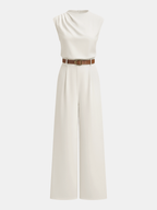 A sleeveless mock neck wide-leg jumpsuit with draped details and a brown leather belt.