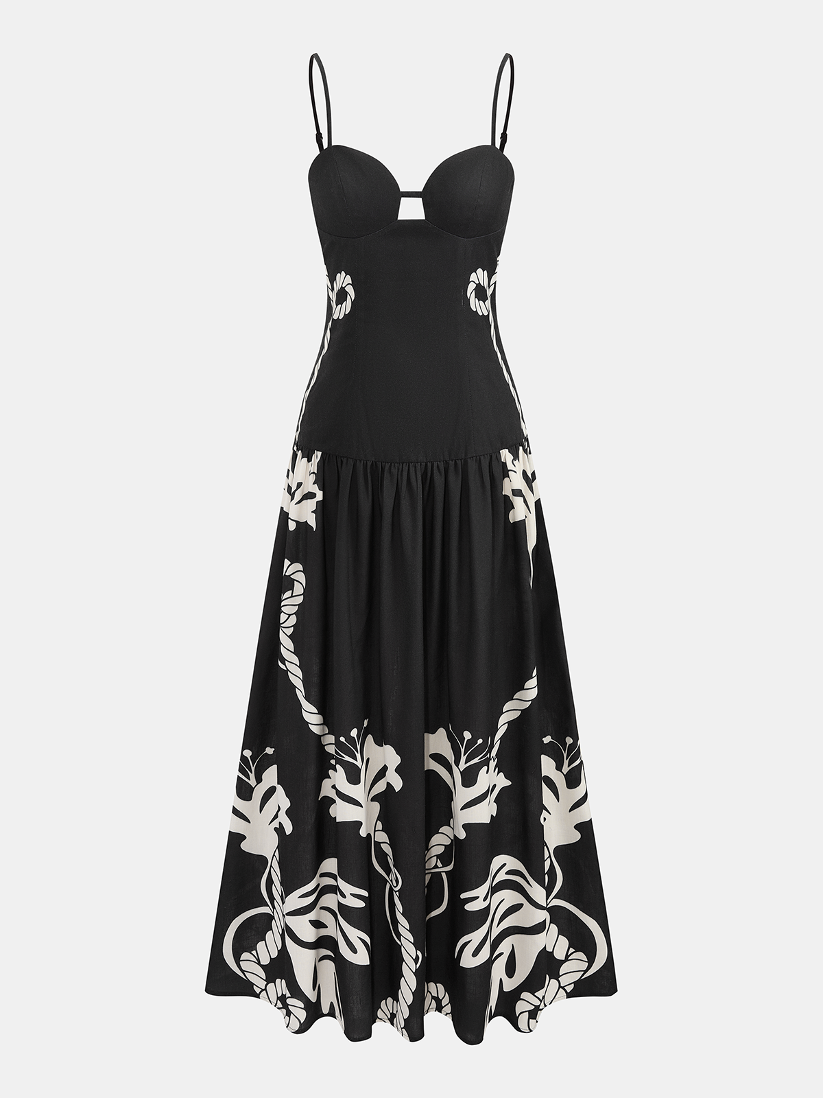 A black slim-fit maxi dress with thin straps and white floral patterns at the hem.