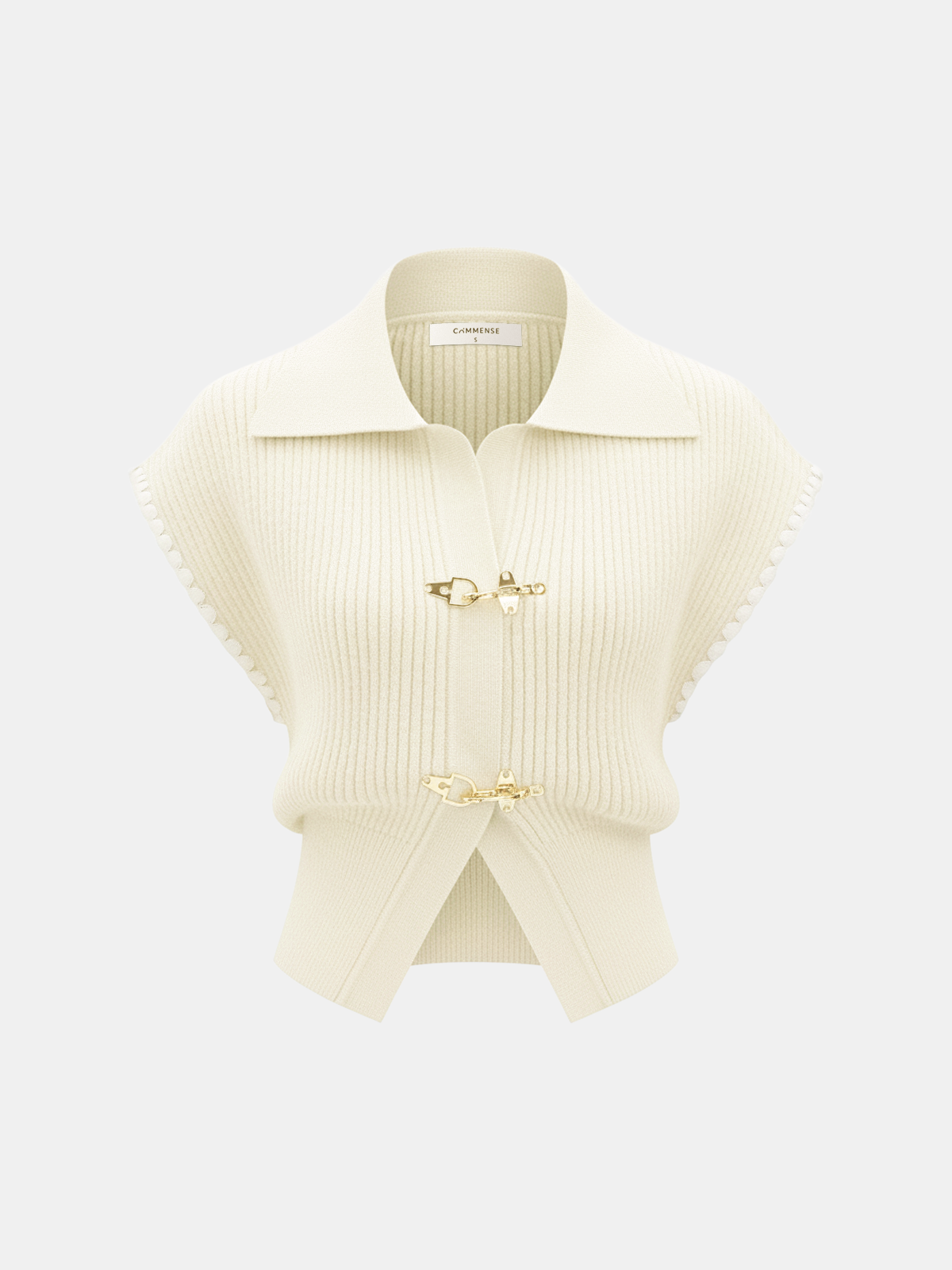 Cream knit vest with contrast trim, short sleeves, wide collar, and gold metal clasps.