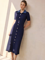 A short-sleeve, navy, ribbed midi knit dress with a denim collar and buttons.