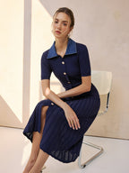 A denim-collared, ribbed midi knit dress in a soft, textured fabric with elegant lines.
