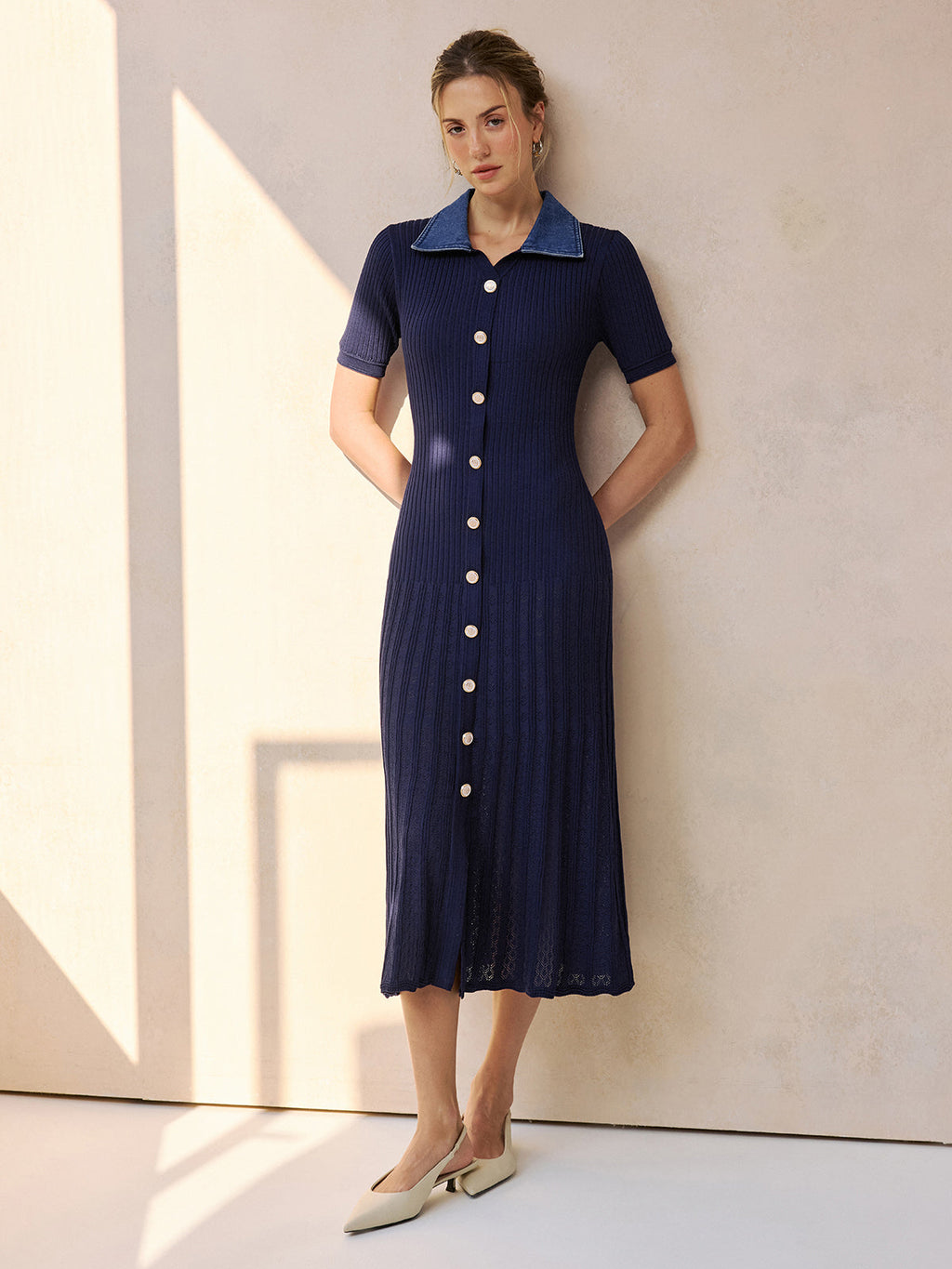 LA FINE FLEUR Denim-Collared Ribbed Midi Knit Dress with denim collar and white buttons.