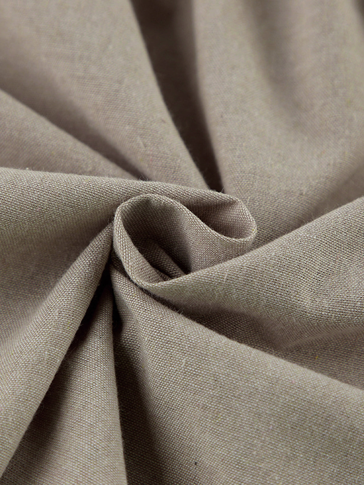 Light brown cotton linen dress with coarse texture, gathered folds, and twisted shoulder ties.