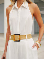 LA FINE FLEUR halter neck jumpsuit with collar and wide legs in a sleek style.