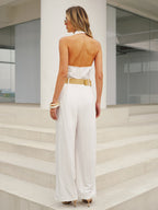 Sleeveless halter neck jumpsuit with collar and wide legs by LA FINE FLEUR.