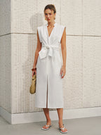 The LA FINE FLEUR cotton-linen V-neck sleeveless dress with a bow split detail.