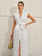 LA FINE FLEUR cotton-linen V-neck sleeveless dress with bow split detailing.